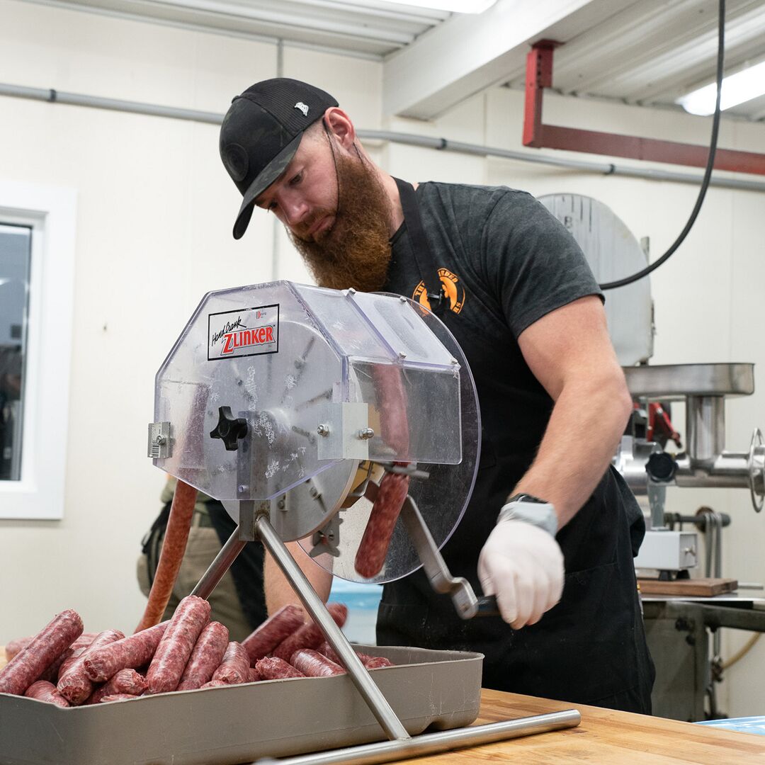 Scott with the Z linker making sausage links